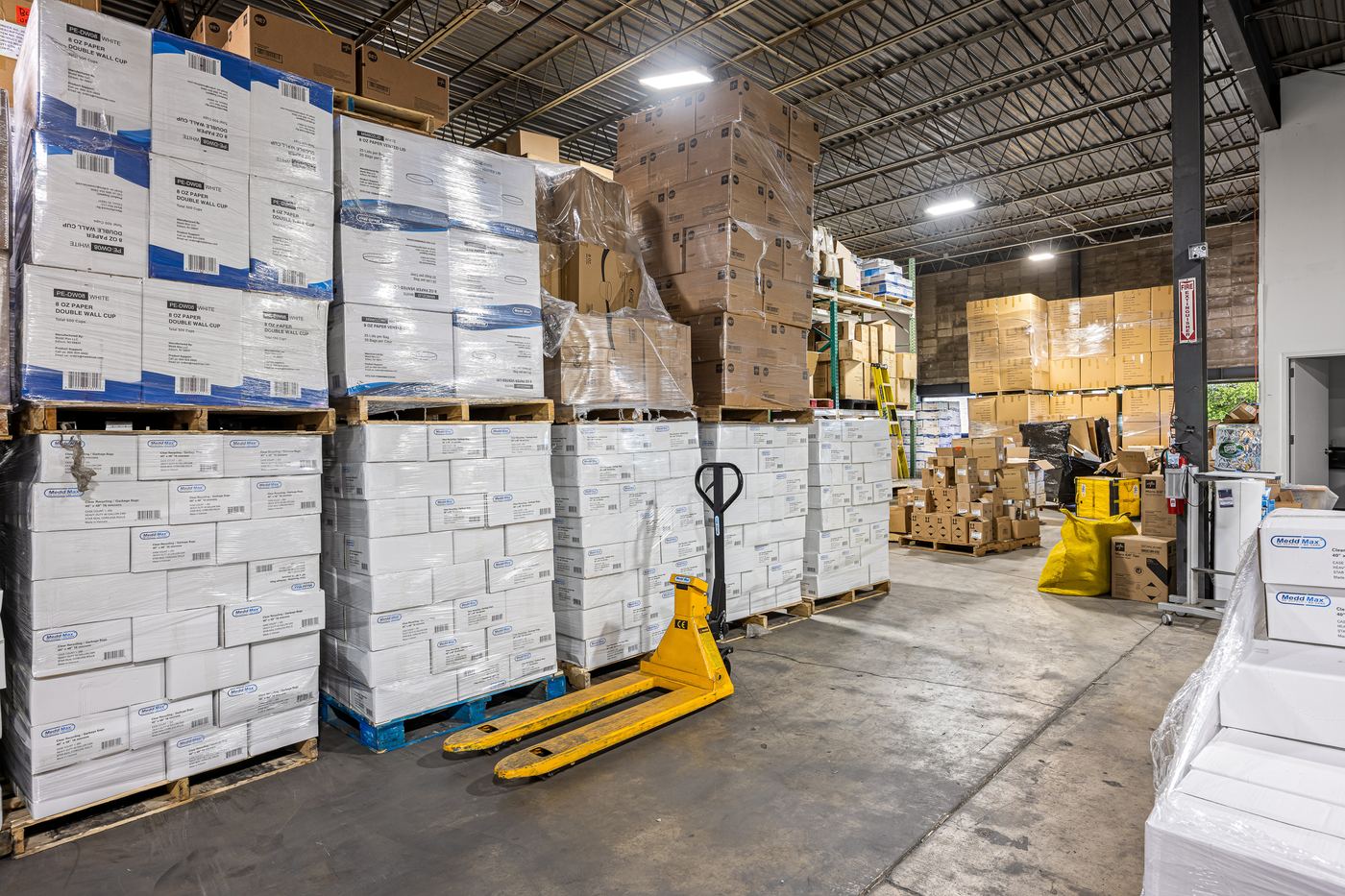 Pallets of supplies staged in the Medd Max warehouse