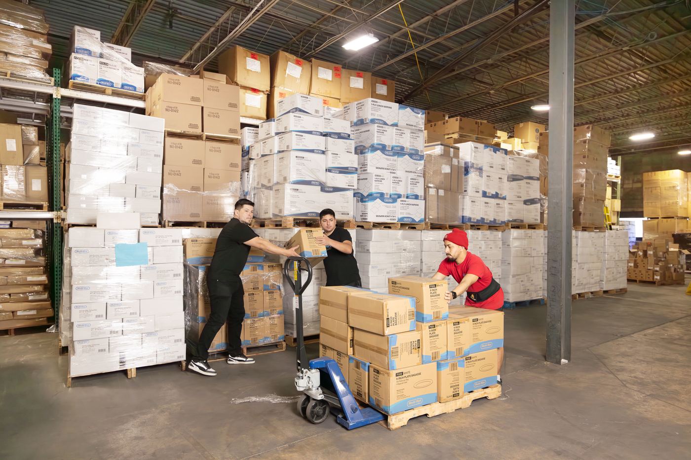 Medd Max warehouse crew moving a pallet